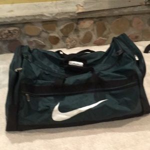 Large Nike sport or travel bags. Green
